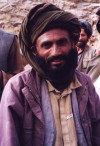 Afghanistan: Kuchi man wearing a turban - a Kuchi is a transhumant or nomadic pastoralist - photo by Anne Dinnan