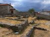 Kruje, Durres County, Albania: ruins and dark sky - photo by J.Kaman