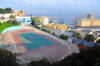Oran, Algeria / Algrie: oval track surrounding a handball field - view over the harbour, Quai Ste. Thrse - photo by M.Torres |  piste ovale entourant un terrain de handball - vue sur le port