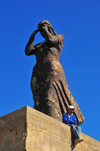 Tipaza, Algeria / Algrie: statue of a fishermans wife in the harbour | femme de pcheur - statue au port - photo by M.Torres