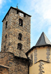 Andorra la Vella, Andorra: St Esteve Church - undecorated Romanesque three-story stone bell-tower with clock - Esglsia parroquial de Sant Esteve - photo by M.Torres