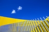 Australia - Melbourne (Victoria): abstract - fence agains yellow background - photo by  Picture Tasmania/Steve Lovegrove