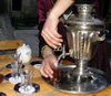 Sheki / Shaki - Azerbaijan: serving tea, Azeri style - armud glasses and samovar - photo by N.Mahmudova