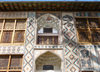 Sheki / Shaki - Azerbaijan: Sheki Khans' palace - facade - muqarnas, covered with mirror fragments on the first floor - photo by N.Mahmudova