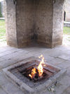 Surakhany - Absheron peninsula, Azerbaijan: Ateshgah fire temple - the flame - the fire was once fed by a natural gas vent, now piped in - photo by G.Monssen
