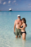 28 Bahamas - Half Moon Cay - Married couple at Half Moon Cay, Bahamas with Holland America cruise ship ms Veendam in the background (photo by David Smith)