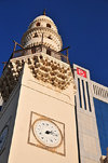 Manama, Bahrain: Abdulla  Ali Yateem Mosque - square minaret with four clocks and decorated with muqarnas - photo by M.Torres