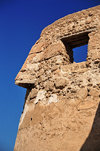 Arad, Muharraq Island, Bahrain: Arad Fort - detail of a tower with the 'nose' for marksmen or for dumping hot oil on attackers - photo by M.Torres