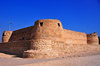 Arad, Muharraq Island, Bahrain: Arad Fort - protected the sea passages of Muharraq's shallow seashores - Qal'at 'Arad - square fortress with four cylindrical towers, typical of the local military architecture - photo by M.Torres