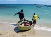 Caribbean - Six Men's Bay - St Peter Parish: entering the sea - near Port St Charles - man with small boat - photo by P.Baldwin