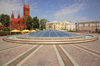 Minsk, Belarus: Independence Sq. - the glass dome is the skylight for the underground shopping center 'Stolitsa' - church of St. Simeon and St.Helen in the background - photo by A.Dnieprowsky