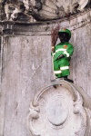 Belgium - Brussels: Manneken Pis fountain - dressed as a street sweeper (photo by G.Frysinger)