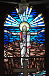 Belize City, Belize: St. John's Anglican cathedral - Christ - stained glass window and fan - photo by M.Torres