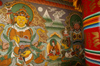 Bhutan - two guardians of the four directions, in Chimi Lhakhang monastery and prayer wheel - photo by A.Ferrari
