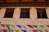 Bhutan - Paro dzongkhag - Prayer flags, in front of the walls of Taktshang Goemba - photo by A.Ferrari