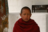 Bhutan - Thimphu - young Buddhist monk, in the National Memorial Chorten - photo by A.Ferrari