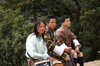Bhutan - group of Bhutanese people, resting on their way to Cheri Goemba - photo by A.Ferrari