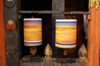 Bhutan - Jampa Lhakhang - two prayer wheels, bothspinning - photo by A.Ferrari
