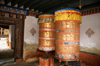 Bhutan - Jampa Lhakhang - large prayer wheels - photo by A.Ferrari