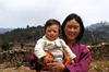Bhutan - Ura valley - Bhutanese woman with a baby - photo by A.Ferrari