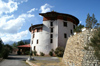 Bhutan - Paro: Bhutan's national museum - ancient Ta-dzong building - photo by A.Ferrari