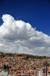La Paz, Bolivia: south-western suburbs and El Alto - favelas, blue sky and white clouds - photo by M.Torres