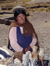 Tiwanaku / Tiahuanacu, Ingavi Province, La Paz Department, Bolivia: Aymara woman sells souvenirs in the nearby village of Tiwanaku - Bolivian Altiplano - photo by C.Lovell
