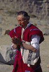 Isla del Sol, Lake Titicaca, Manco Kapac Province, La Paz Department, Bolivia: a kallawayas (shaman) performs a koada (offering) to Pancha Mama (Mother Earth) - prayer - photo by C.Lovell
