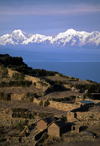 Isla del Sol, Lake Titicaca, Manco Kapac Province, La Paz Department, Bolivia: agricultural terraces - Nevado illampu (7010 m) is visible behind the village of Challapampa - photo by C.Lovell