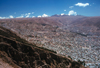 La Paz, Bolivia: city and horizon - Mt. Illimani (21120 ft ) in background - a bowl surrounded by the high altiplano - photo by J.Fekete