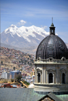 La Paz, Bolivia: dome and drum lantern of the Metropolitan Cathedral against the Illimani mountain, the highest peak in the Cordillera Real, Andes - photo by M.Torres