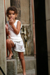 Brazil / Brasil - Rio de Janeiro: Vila Canoas Favela - slum - shy girl / garota tmida - photo by N.Cabana