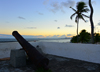 Olinda, Pernambuco, Brazil: Fort of St Francis at sunset - cannon aimed at the ocean - 17th century Portuguese fortress built by Cristvo lvares - Recife in the distance - Fortim square - Forte de So Francisco (Fortim do Queijo) - photo by M.Torres