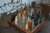 Brazil / Brasil - Porto Acre: memorial room - dug up bottles (photo by Marta Alves)