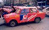 Bulgaria - Sofia: betraying the proletariat, DDR's Trabant joins capitalism (KFC delivery car on Stamboliski st.) (photo by M.Torres)