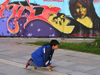 Bulgaria - Sofia: grafitti in Yuzhen Park - boy on a skate (photo by J.Kaman)