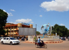 Ouagadougou, Burkina Faso: traffic on UN Roundabout / Rond-point des Nation Unies with is central globe and the post office building, Sonapost - Nelson Mandela Avenue - photo by M.Torres