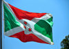 Gitega / Kitega, Burundi: Burundian flag - Saint Andrew's Cross and three stars of David, representing the words in the national motto 'Unit, Travail, Progrs' - photo by M.Torres