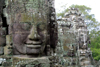 Angkor, Cambodia / Cambodge: Bayon - Giant sculpted faces of Jayavarman VII (Angkor Thom) - photo by R.Eime