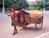 Cambodia / Cambodge - Phnom Penh: the weight of childhood - Sothearos avenue (photo by M.Torres)