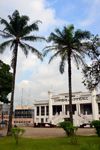 Cameroon, Douala: Chamber of Commerce and coconut trees - built in late Art nouveau style - French colonial architecture - Chambre de Commerce - photo by M.Torres