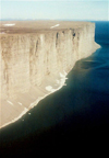 Canada - Prince Leopold island (Nunavut): flying over the cliffs - photo by G.Frysinger