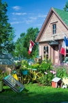 Canada 411 Scenic garden and antiques in front of store in Barton, Nova Scotia, Canada - photo by D.Smith
