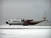 Northwest Territories, Canada: four engined Hercules aeroplane waits on snowy tarmac - First Air Lockheed L-100-30 Hercules - C-GHPW (cn 4799) - photo by Air West Coast