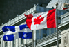 Montreal, Quebec, Canada: Canadian and Quebecer flags in front of the old Palace of Justice - Vieux palais de justice - Rue Notre Dame - Vieux-Montral - photo by M.Torres