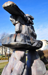 Winnipeg, Manitoba, Canada: Inukshuk over two bears - grounds of the Legislative Palace - first nation stone landmark - photo by M.Torres