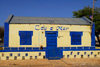 Palmeira, Sal island / Ilha do Sal - Cape Verde / Cabo Verde: colorful building - 'Cu e Mar' handicraft shop by the harbour - photo by E.Petitalot