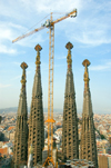 Barcelona, Catalonia: still building Antoni Gaud's Temple Expiatori de la Sagrada Familia - crane - photo by B.Henry