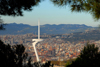 Barcelona, Catalonia: Olympic Tower and the city - located in Montjuc at the Olympic park, it represents an athlete holding the Olympic Flame - photo by T.Marshall