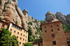 Montserrat, Catalonia: gatehouse to the Montserrat monastery - vertical rock formations - photo by M.Torres